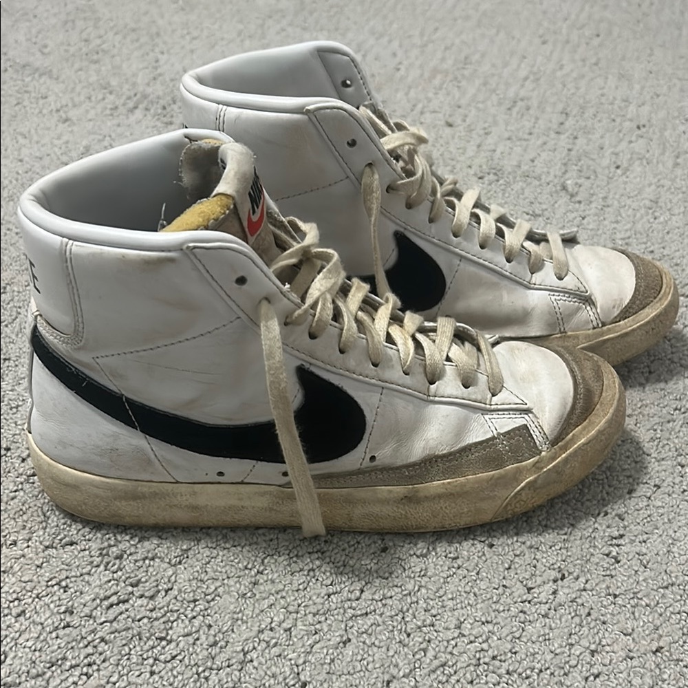 Nike White and Black High-Top Sneakers with Vintage Charm